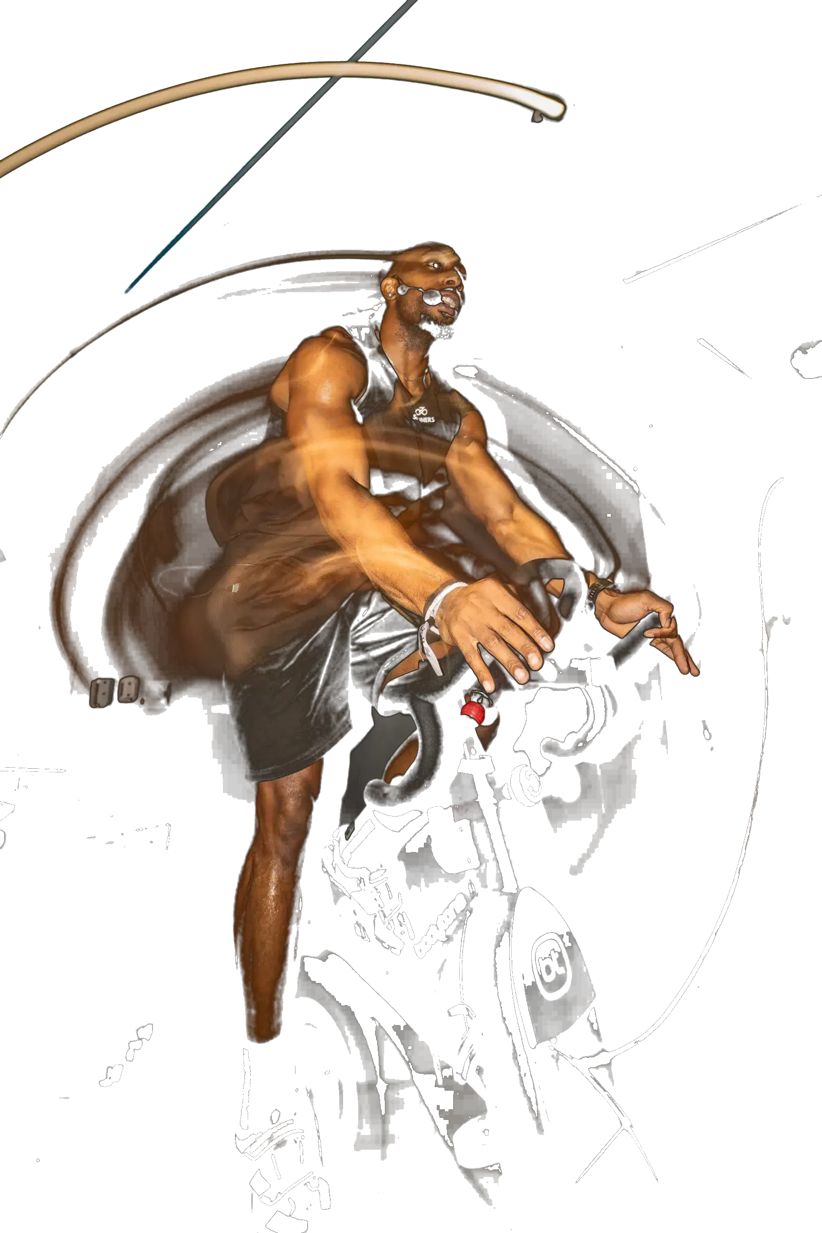 Un coach de Spinners Cycling mène une séance de vélo indoor, saisi en pose longue sous les lumières du studio toulousain